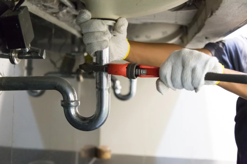 Plumber-Working-On-Drain-Cleaning