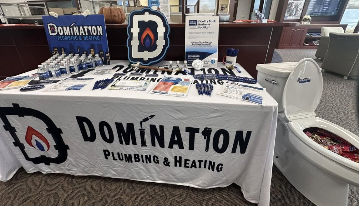 Domination Plumbing & Heating display at local event in the city of Leominster, Massachusetts.